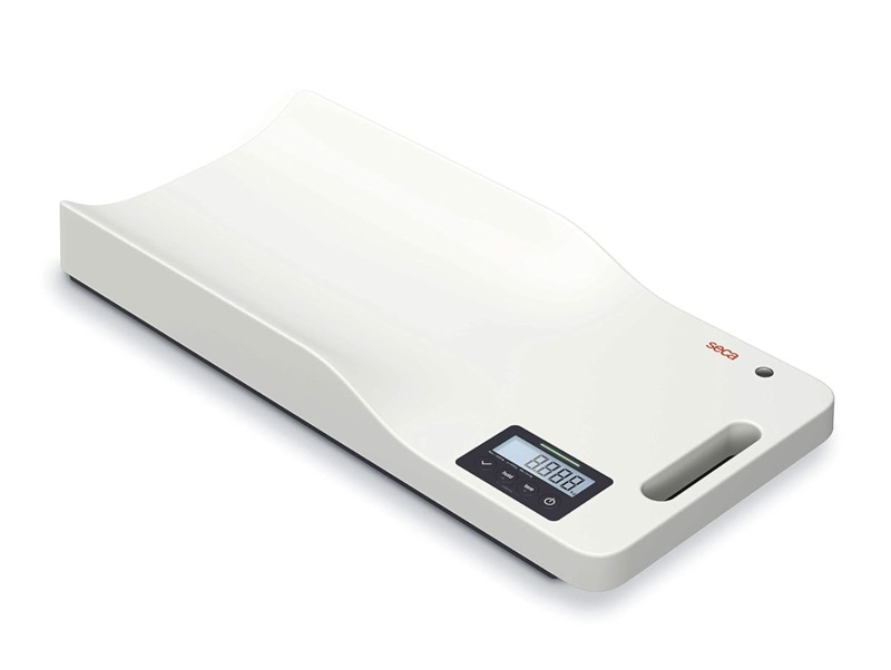 Seca 333 i EMR-ready baby scale with a contoured weighing tray, carrying handle, and digital display