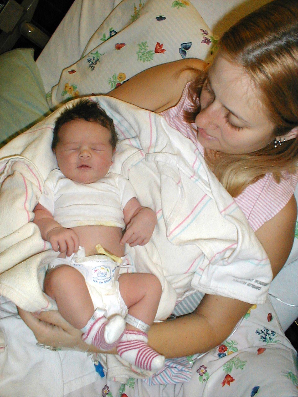 Margaret with her newborn in the hospital